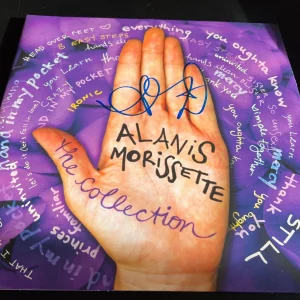 ALANIS MORISSETTE SIGNED AUTOGRAPH VINYL COLLECTION JAGGED LITTLE PILL BECKETT