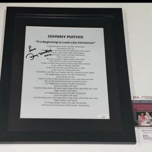 JOHNNY MATHIS SIGNED IT'S BEGINNING TO LOOK LIKE CHRISTMAS LYRIC SHEET JSA COA