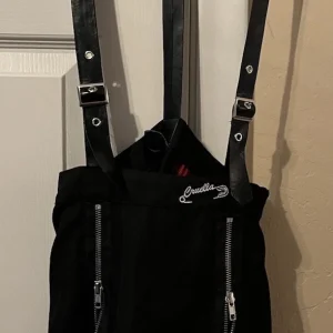 Her Universe Disney Cruella Zipper Pleated Suspender Skirt Size XS