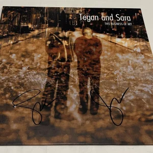 TEGAN AND SARA SIGNED THIS BUSINESS OF ART VINYL RECORD JSA
