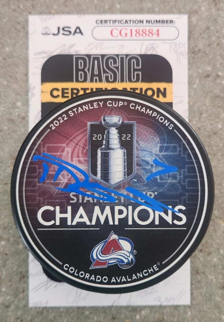 Devon Toews Signed 2022 Stanley Cup Champions Puck w JSA COA  Colorado Avalanche