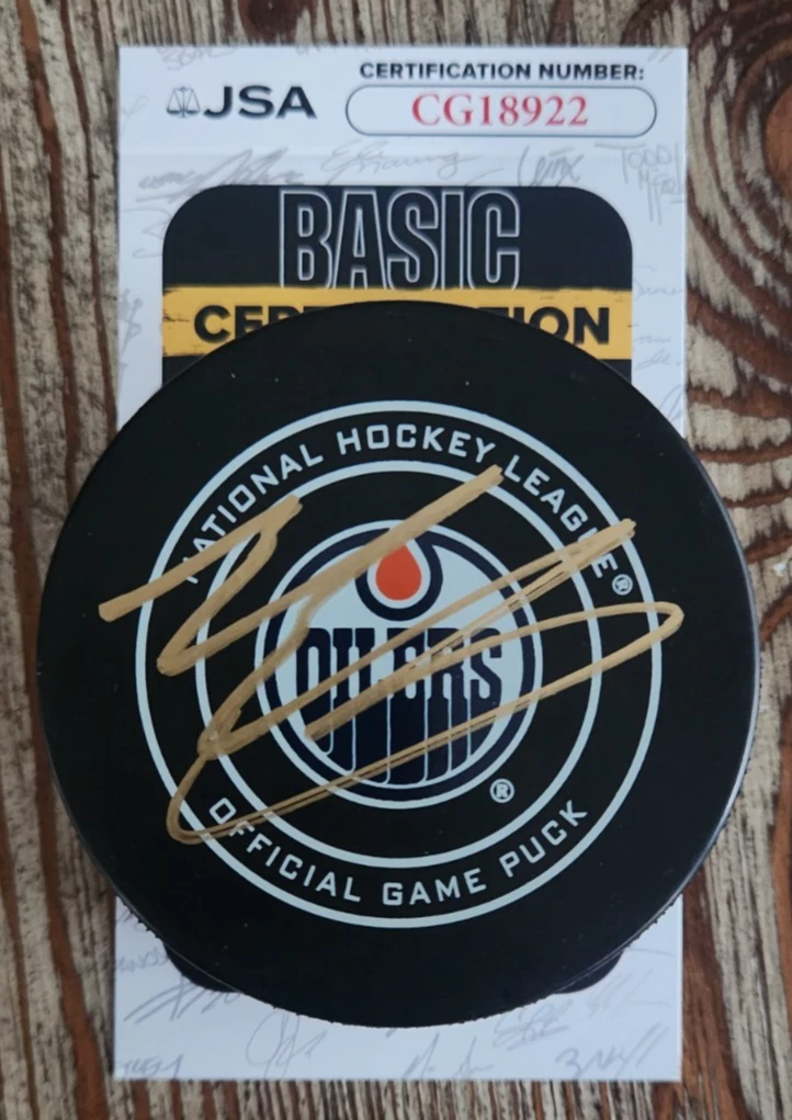 Evan Bouchard Signed Official NHL Game Puck w/ JSA COA #CG18922 Edmonton Oilers