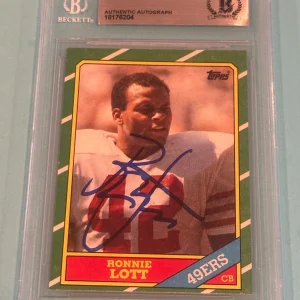 RONNIE LOTT Signed 1986 TOPPS Card #168 Beckett Authenticated (BAS)