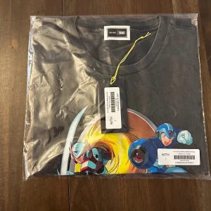 KITH X CAPCOM MEGA MAN T TEE SHIRT BLACK SIZE L LARGE IN HAND NWT NEW MARVEL