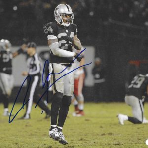 CHARLES WOODSON SIGNED OAKLAND RAIDERS FOOTBALL 8X10 PHOTO HEISMAN JSA