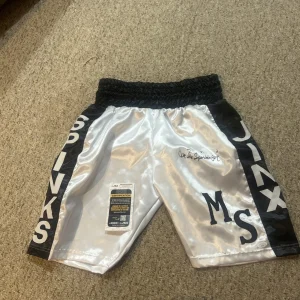 MIKE MICHAEL SPINKS JINX SIGNED AUTOGRAPH BOXING TRUNKS SHORTS JSA COA BOXER HOF
