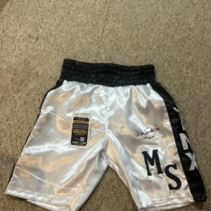 MIKE MICHAEL SPINKS JINX SIGNED AUTOGRAPH BOXING TRUNKS SHORTS JSA COA BOXER HOF