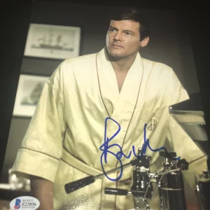 ROGER MOORE SIGNED AUTOGRAPH 8x10 PHOTO JAMES BOND SEAN CONNERY BECKETT BAS D