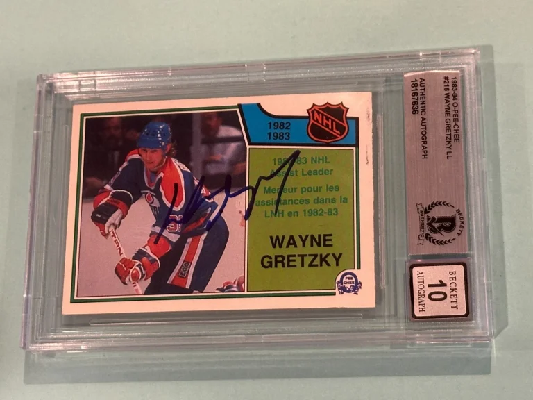 WAYNE GRETZKY Signed 1983-84 O-PEE-CHEE A Leader Card #216 Beckett BAS AUTO 10