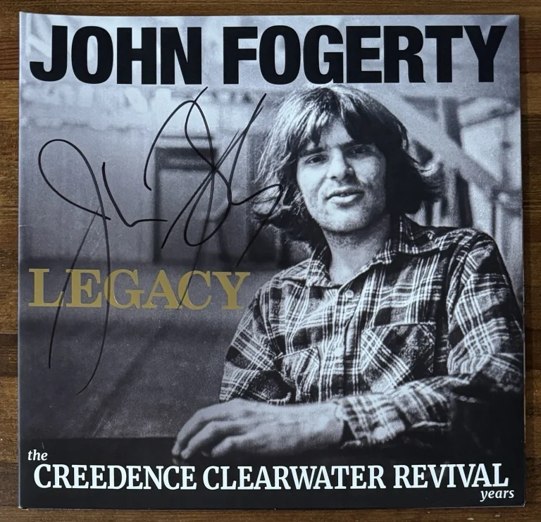 JOHN FOGERTY SIGNED LEGACY VINYL LP CREEDENCE CLEARWATER REVIVAL BECKETT BAS COA