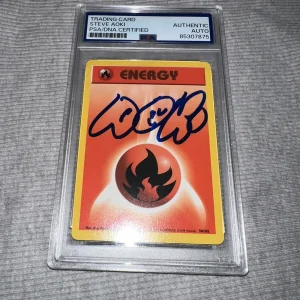 Steve Aoki Signed Official Pokemon Trading Card 99 Base Unlimited Fire PSA/DNA
