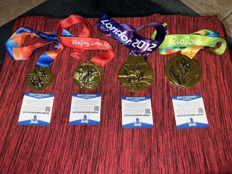 Ryan Lochte Signed Set Of 4 Replica Gold Medals Athens, Beijing, London & Rio