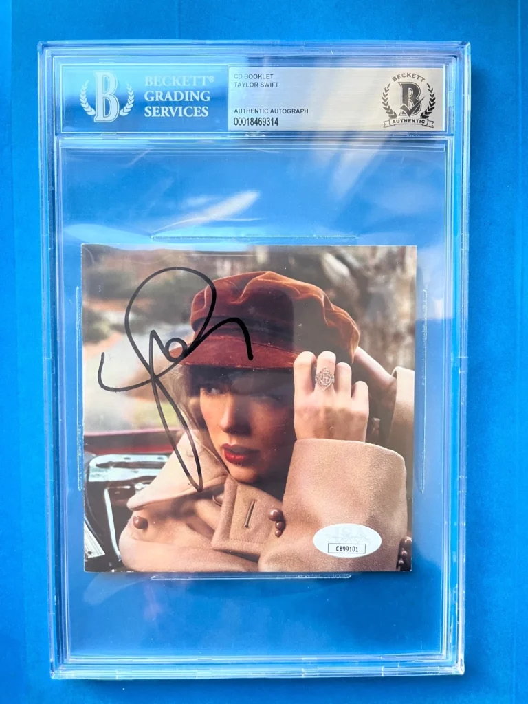 Taylor Swift Signed Auto Red CD Booklet Beckett BAS ENCAPSULATED CASE