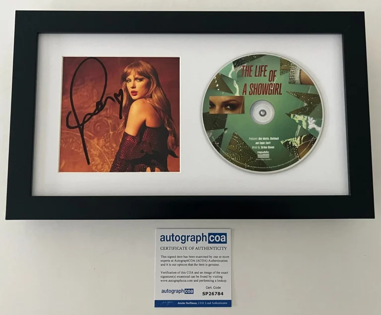 TAYLOR SWIFT SIGNED THE LIFE OF A SHOWGIRL FRAMED & MATTED CD B & AUTOGRAPH COA
