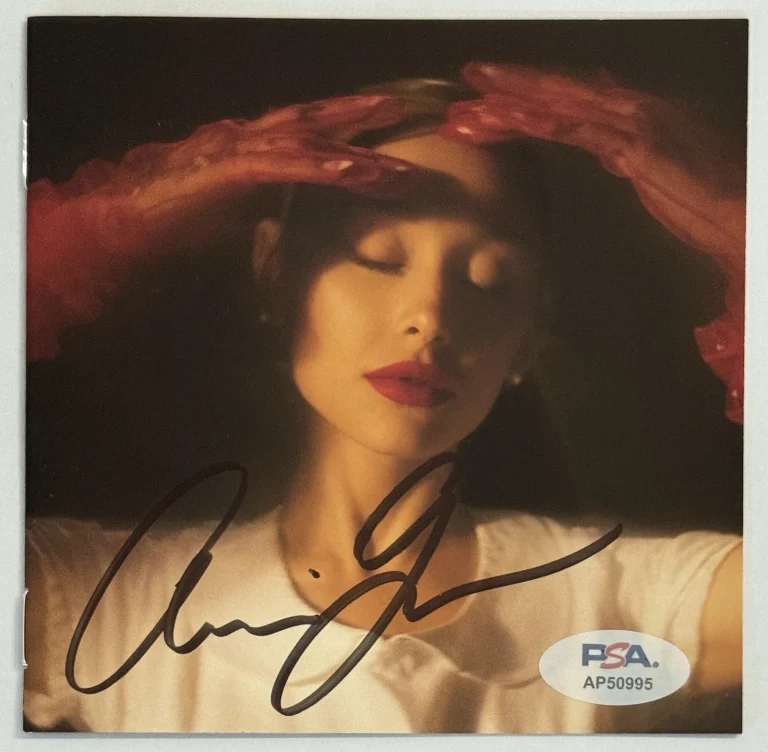 Ariana Grande SIGNED Eternal Sunshine CD Book PSA DNA COA Wicked FULL SIGNATURE