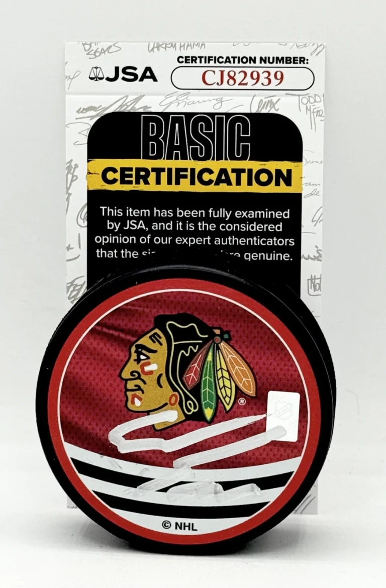 Spencer Knight signed Chicago Blackhawks Reverse Retro Puck autographed JSA
