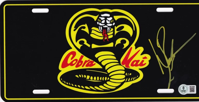 WILLIAM ZABKA SIGNED (COBRA KAI) METAL LICENSE PLATE BECKETT BAS 4W124568 COLLECTIBLE MEMORABILIA