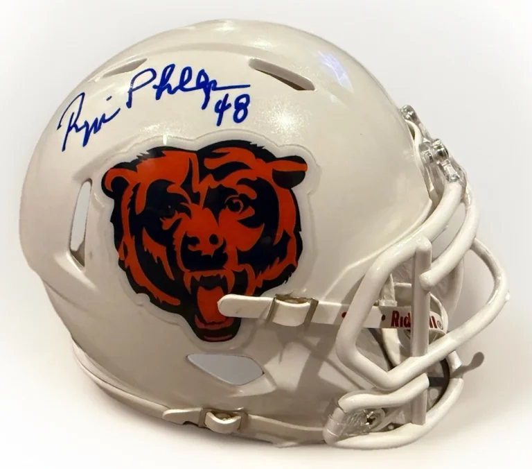 REGGIE PHILLIPS signed (CHICAGO BEARS) mini football helmet BECKETT BAS BU41248