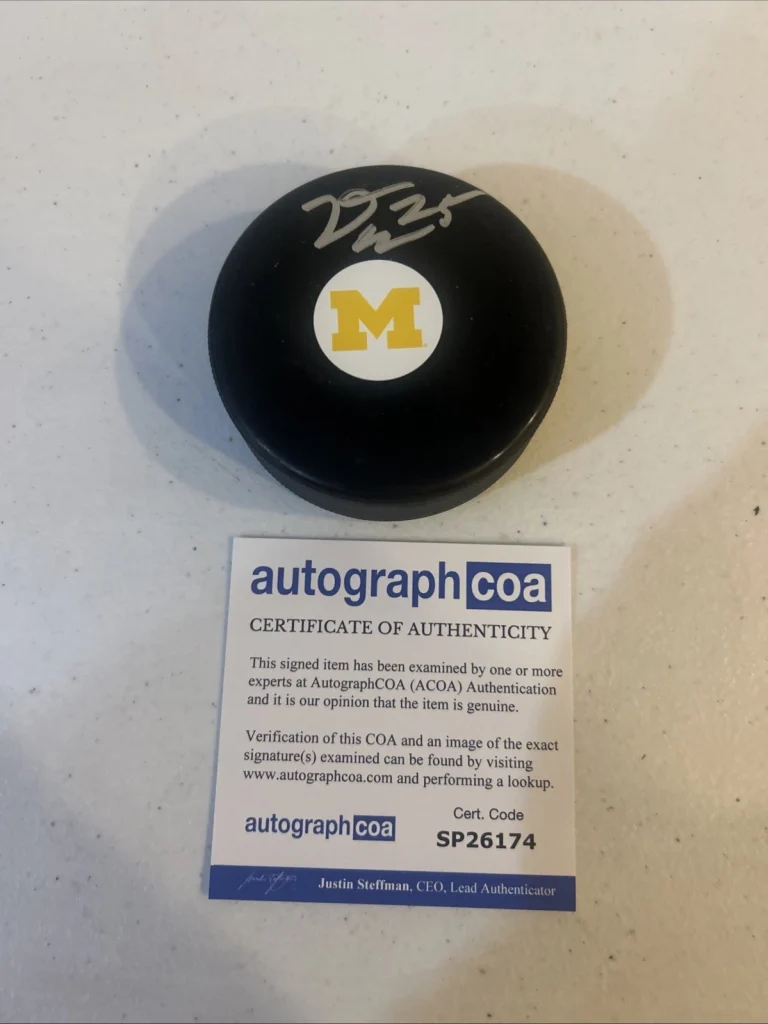 MICHIGAN WOLVERINES- DYLAN DUKE SIGNED AUTOGRAPH HOCKEY PUCK ACOA LIGHTNING