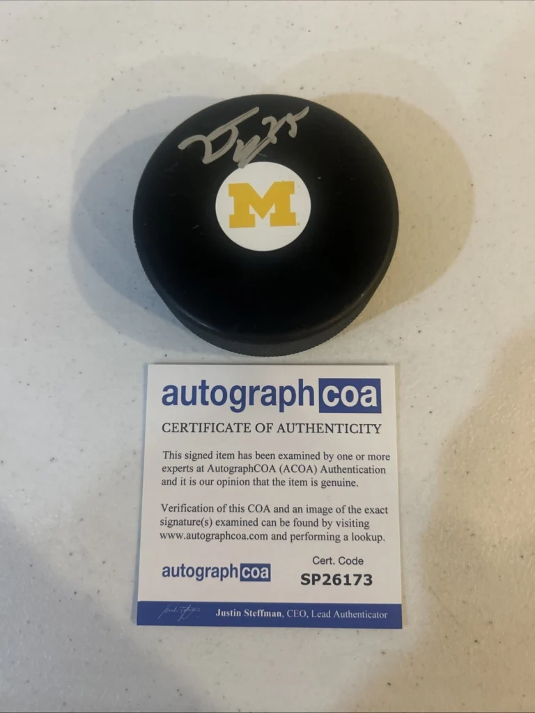 MICHIGAN WOLVERINES- DYLAN DUKE SIGNED AUTOGRAPH HOCKEY PUCK ACOA LIGHTNING