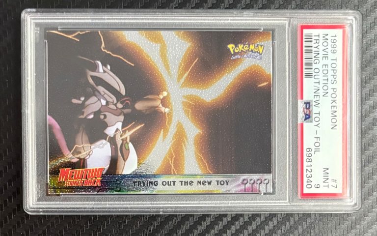 1999 Pokemon Topps Movie Edition #7 Trying Out New Toy Foil PSA 9