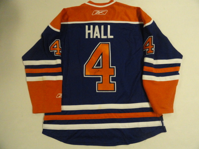 TAYLOR HALL SIGNED EDMONTON OILERS JERSEY PROOF LICENSED JSA AUTHENTICATED
