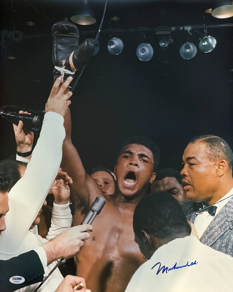 MUHAMMAD ALI SIGNED 16X20 PSA DNA ARMS IN AIR GOAT I09202