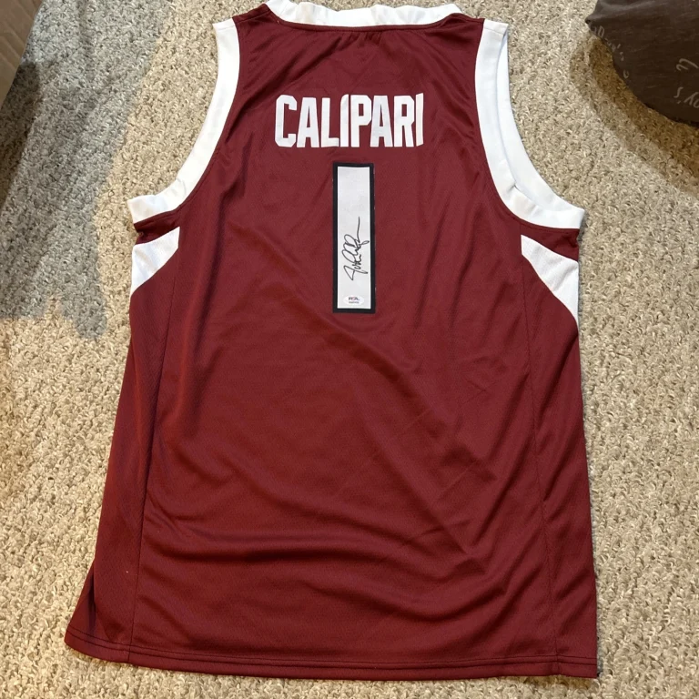 ARKANSAS RAZORBACKS- JOHN CALIPARI SIGNED AUTOGRAPH JERSEY PSA DNA COA HOF COACH