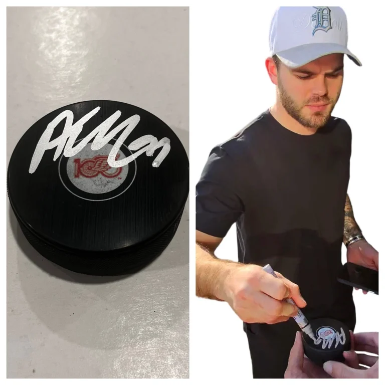 ALEX DEBRINCAT SIGNED DETROIT RED WINGS HOCKEY PUCK W/ CASE COA