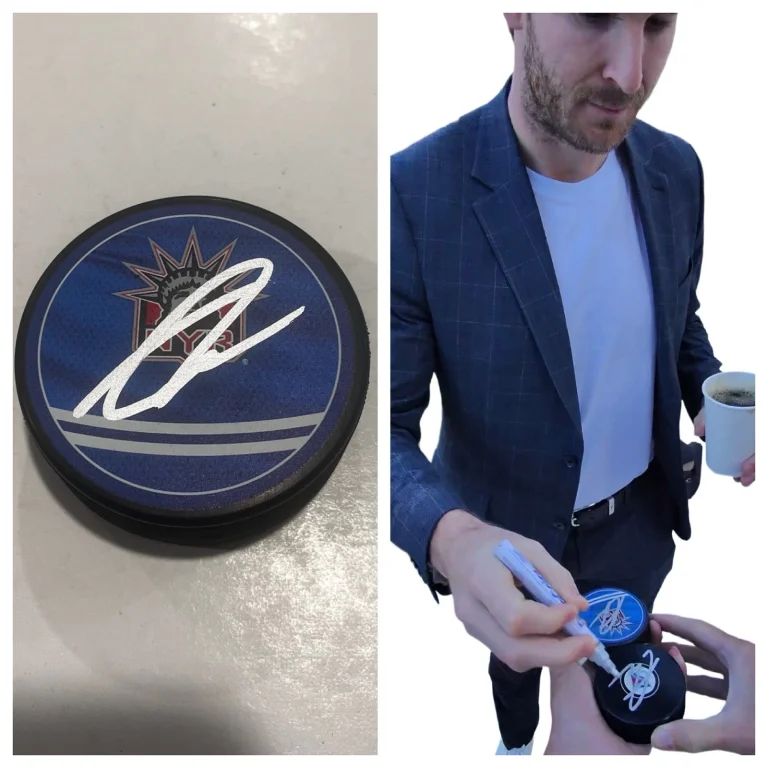 TAYLOR RADDYSH SIGNED NEW YORK RANGERS HOCKEY PUCK W/ CASE COA