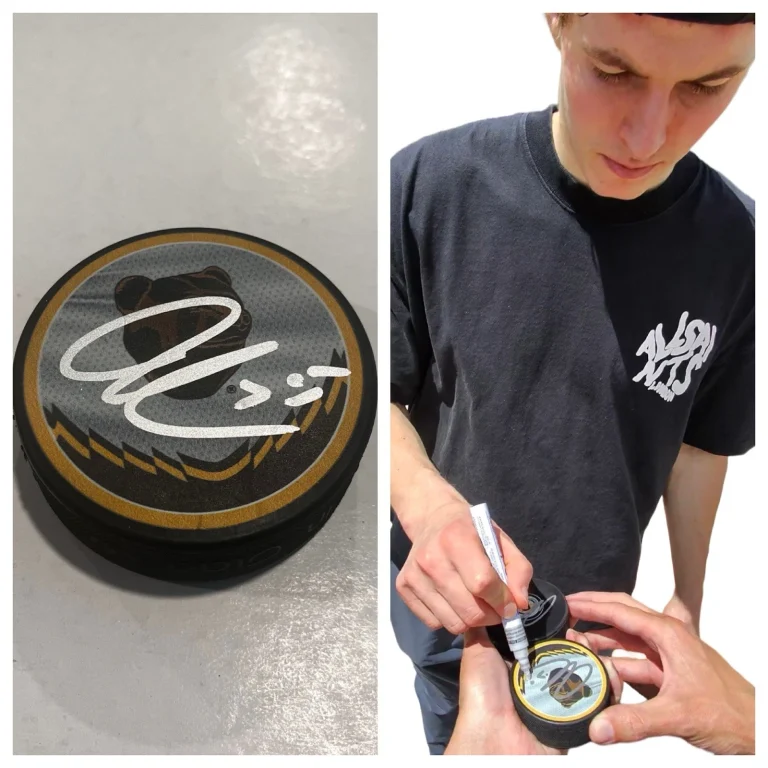 LUKAS REICHEL SIGNED BOSTON BRUINS HOCKEY PUCK W/ CASE COA