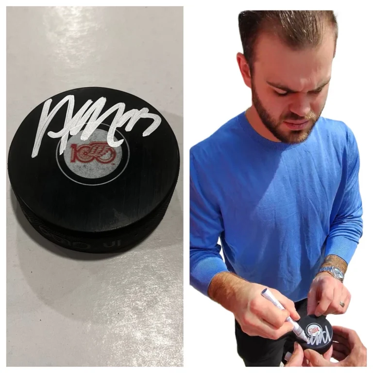 ALEX DEBRINCAT SIGNED DETROIT RED WINGS HOCKEY PUCK W/ CASE COA