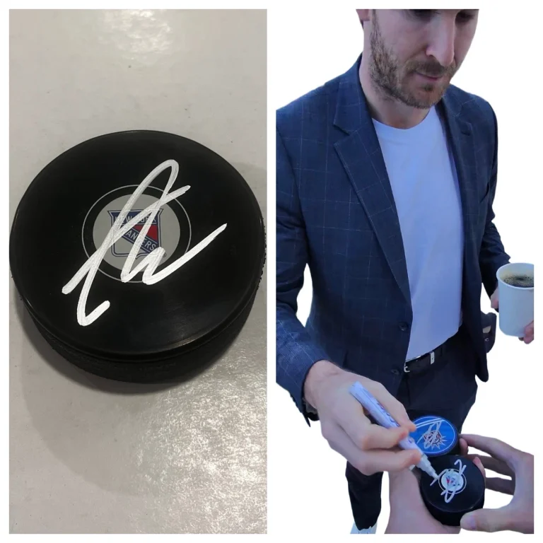 TAYLOR RADDYSH SIGNED NEW YORK RANGERS HOCKEY PUCK W/ CASE COA