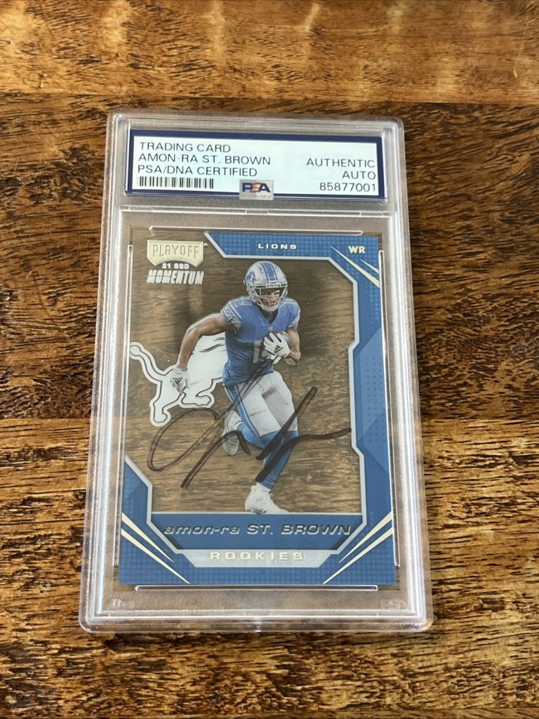 Amon-Ra St. Brown IP Signed Panini Rookie Card PSA DNA Slab Lions Autographed