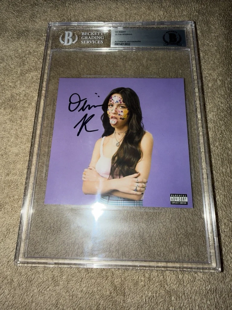 Olivia Rodrigo Signed Sour CD Booklet Superstar Beautiful Beckett Encap