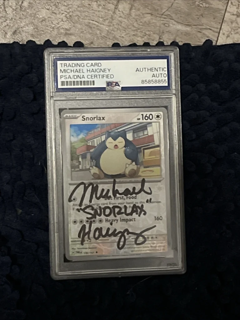 MICHAEL HAIGNEY SIGNED AUTOGRAPHED POKEMON CARD SNORLAX PSA ENCAPSULATED