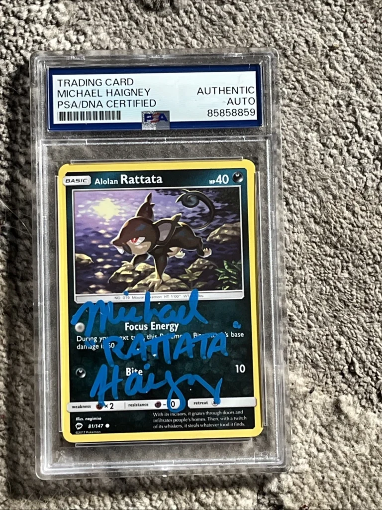 MICHAEL HAIGNEY SIGNED AUTOGRAPHED POKEMON CARD RATTATA PSA ENCAPSULATED