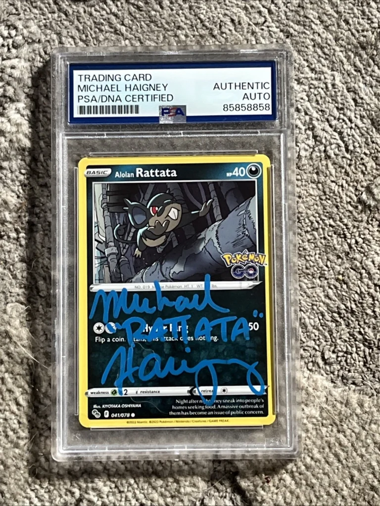 MICHAEL HAIGNEY SIGNED AUTOGRAPHED POKEMON CARD RATTATA PSA ENCAPSULATED