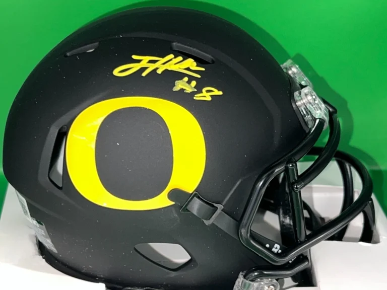 JEVON HOLLAND OREGON DUCKS MATTE BLACK  BECKETT AUTH RIDDELL SIGNED MINI HELMET