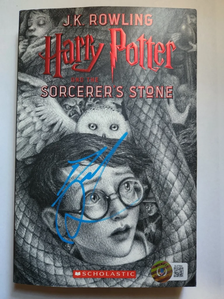 DANIEL RADCLIFFE SIGNED HARRY POTTER BOOK ILLUSTRATION COVER BECKETT BAS COA