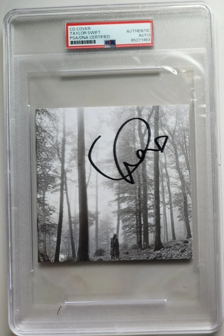 TAYLOR SWIFT SIGNED FOLKLORE CD MIDNIGHTS ERAS TOUR FORTNITE PSA SLAB COA RARE