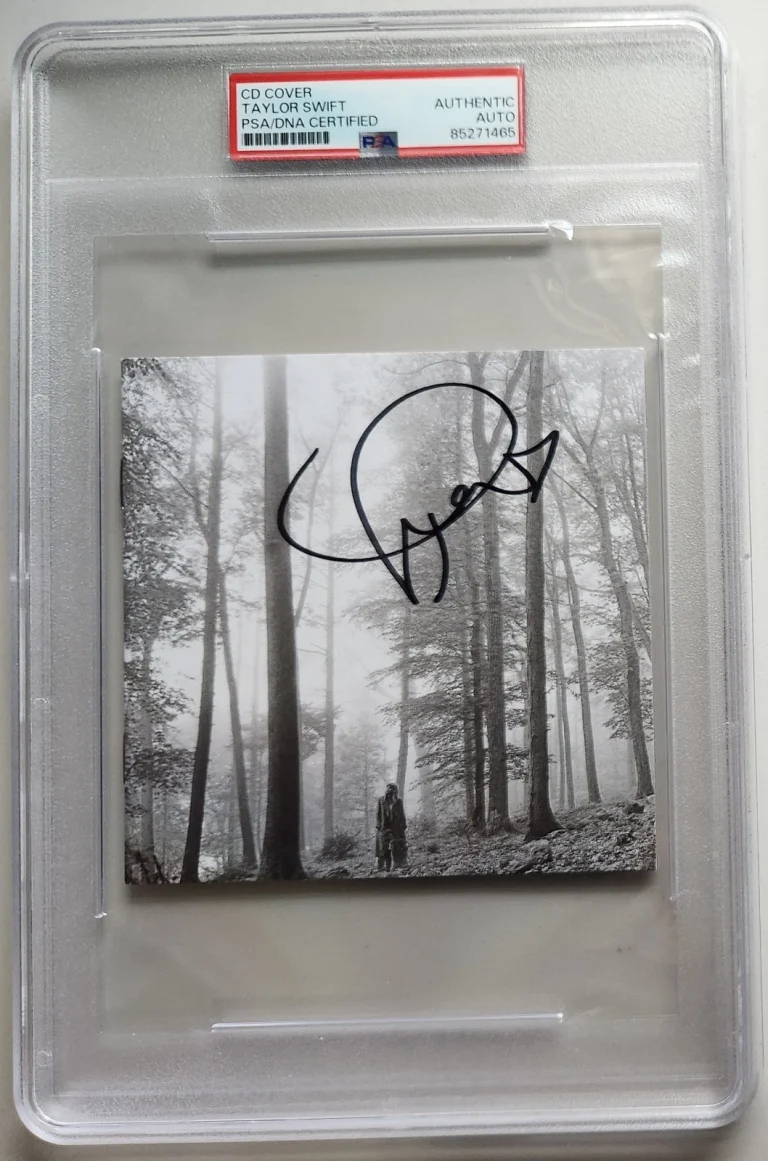 TAYLOR SWIFT SIGNED FOLKLORE CD MIDNIGHTS ERAS TOUR FORTNITE PSA SLAB COA RARE