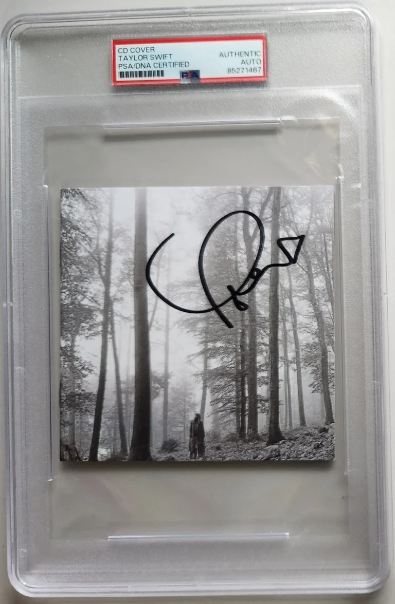 TAYLOR SWIFT SIGNED FOLKLORE CD MIDNIGHTS ERAS TOUR FORTNITE PSA SLAB COA RARE