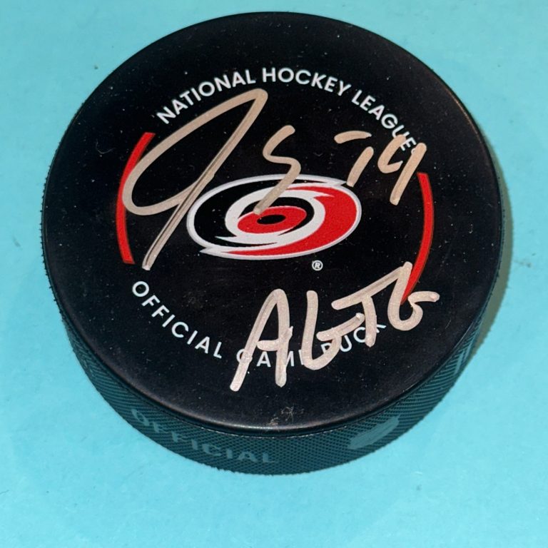 JACCOB SLAVIN Signed Carolina HURRICANES Official GAME Puck Beckett (BAS)