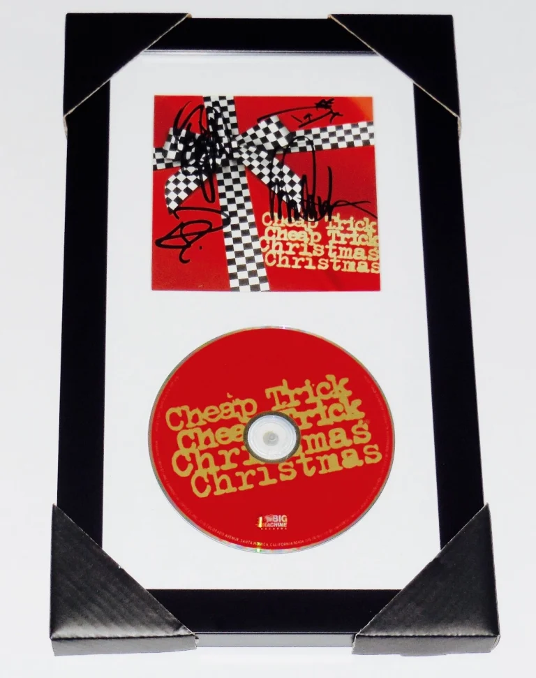 CHEAP TRICK AUTOGRAPHED CHRISTMAS CD COVER (FRAMED & MATTED) - W/ COA!