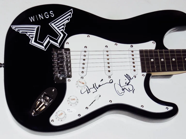 DENNY LAINE & DENNY SIEWELL AUTOGRAPHED GUITAR (WINGS) - JSA COA!