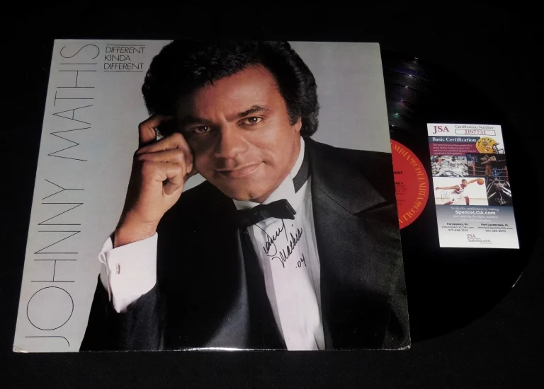 JOHNNY MATHIS AUTOGRAPHED RECORD ALBUM (DIFFERENT KINDA DIFFERENT) - JSA COA!