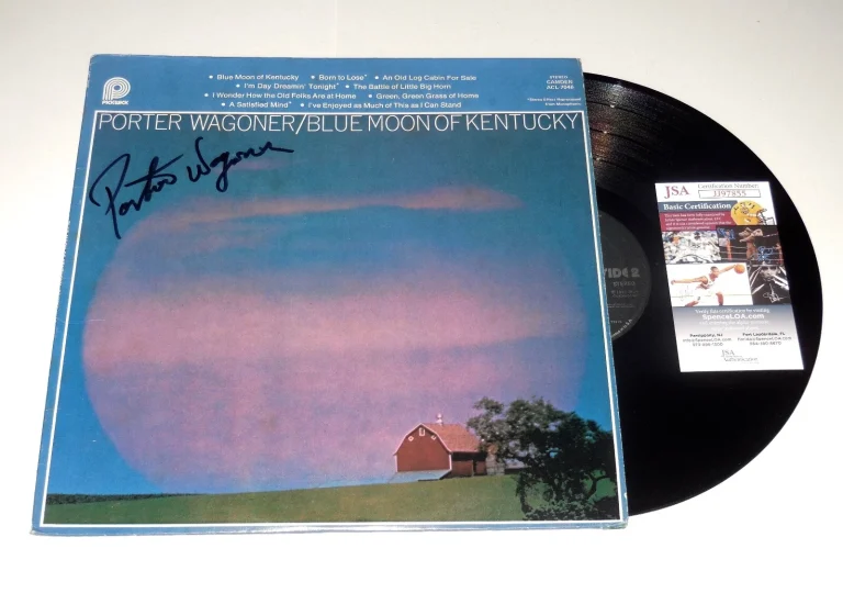 PORTER WAGONER AUTOGRAPHED VINYL RECORD ALBUM (BLUE MOON OF KENTUCKY) - JSA COA!