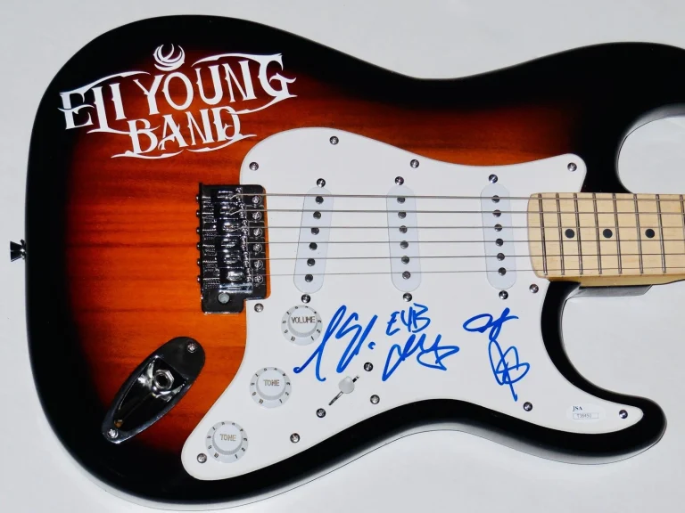 ELI YOUNG BAND AUTOGRAPHED GUITAR (ALL 4 SIGNATURES!) - JSA COA!