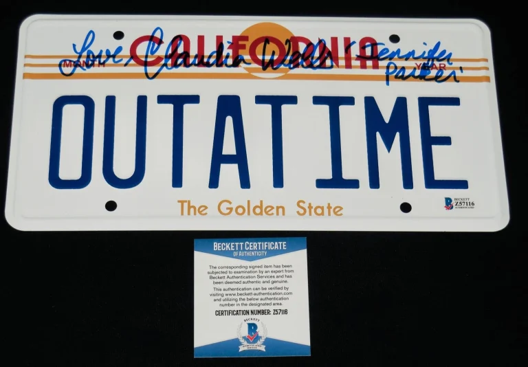CLAUDIA WELLS AUTOGRAPHED LICENSE PLATE (BACK TO THE FUTURE) - BECKETT COA!